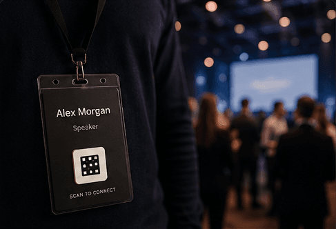 An event badge with a QR opening a current attendee page